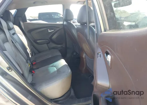 2012 Hyundai Tucson Limited z USA, uszkodzony, nr VIN KM8JU3ACXCU421378